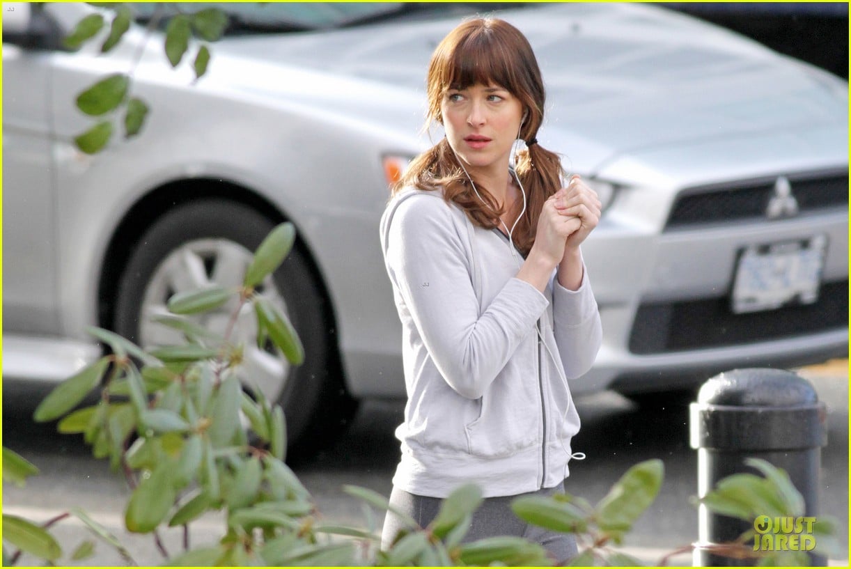 dakota johnson runs for fifty shades in pigtails 083053495