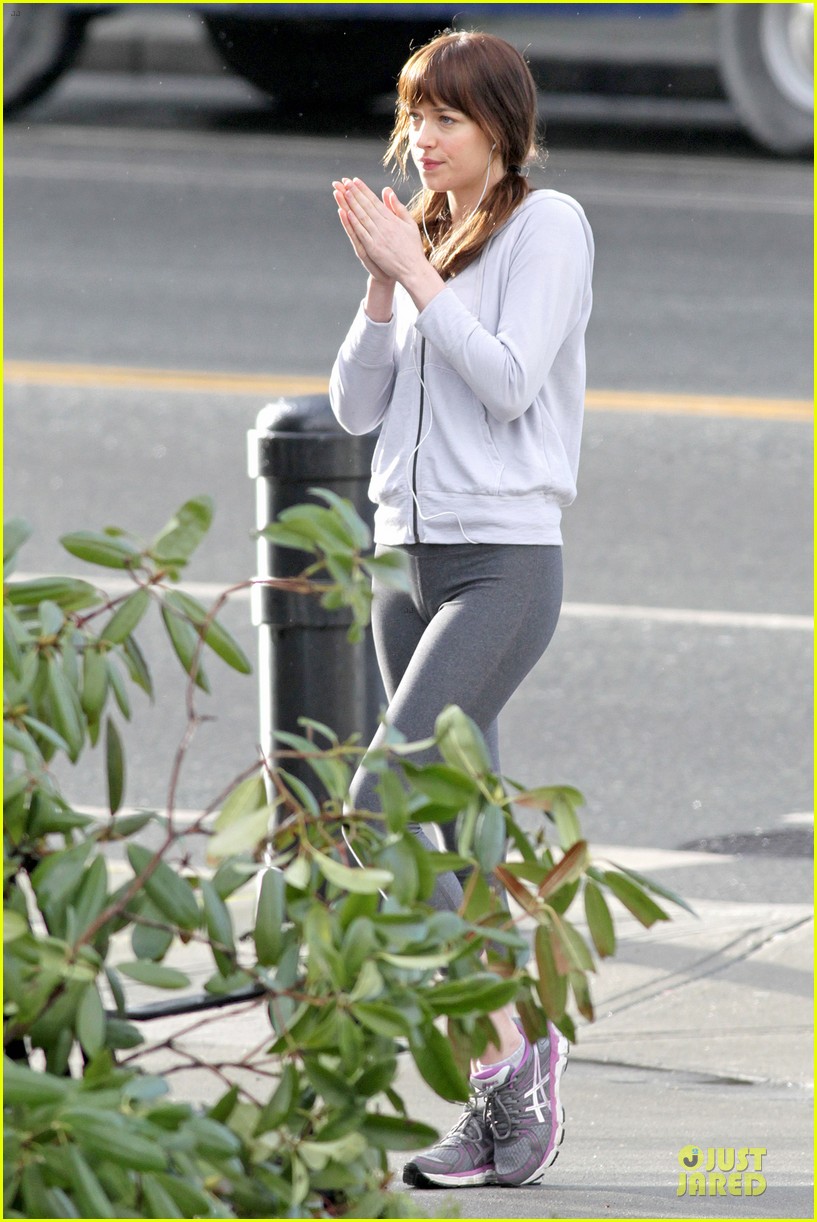 dakota johnson runs for fifty shades in pigtails 153053502