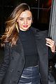miranda kerr shows off cleavage in black bra in front of a mirror 02