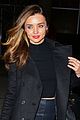 miranda kerr shows off cleavage in black bra in front of a mirror 04
