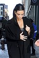 kim kardashian films kuwtk with her sisters khloe sends message on coat fxck yo fur 02