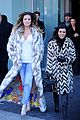 kim kardashian films kuwtk with her sisters khloe sends message on coat fxck yo fur 08