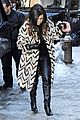 kim kardashian films kuwtk with her sisters khloe sends message on coat fxck yo fur 25