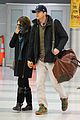 mila kunis ashton kutcher hold hands upon arrival in nyc 01