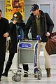 mila kunis ashton kutcher hold hands upon arrival in nyc 03