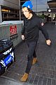 harry styles lands in los angeles after brit awards wins 01