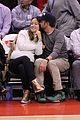 olivia wilde jason sudeikis passionately kiss at clippers game 22