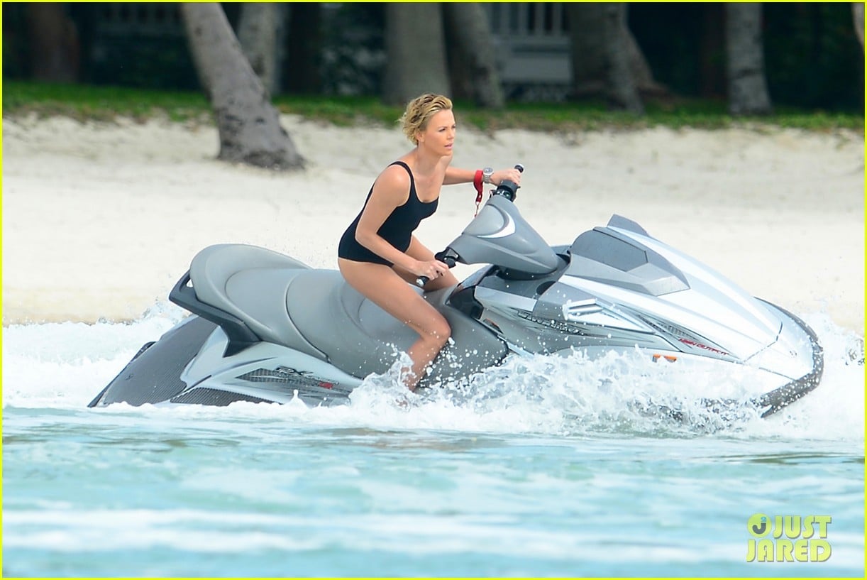 charlize therons bathing suit body is so enviable during jet ski shoot 123075477