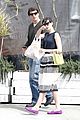 anne hathaway is black white chic for lunch with a pal 11