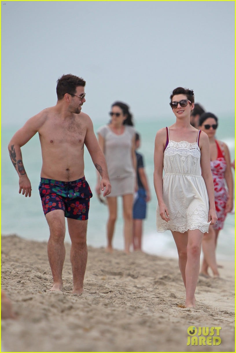 anne hathaway heads back for more beach fun in miami 03
