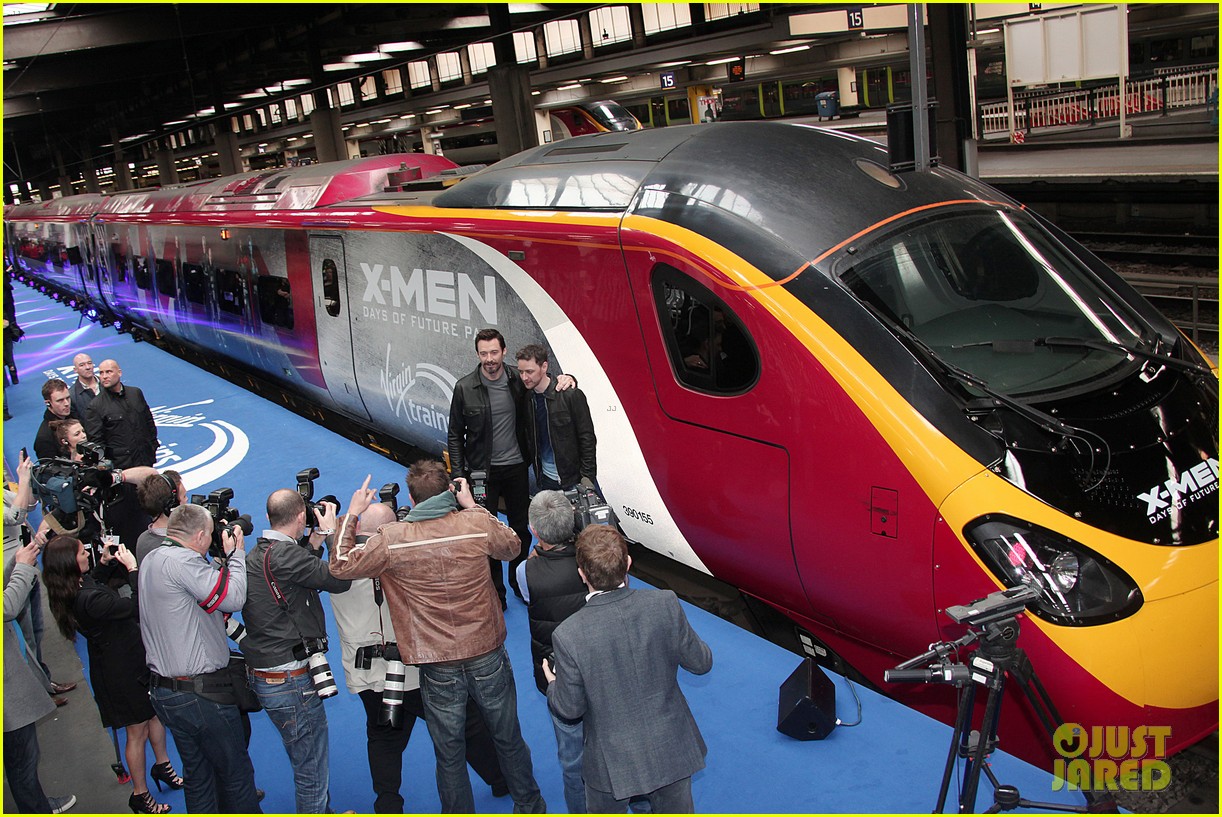 hugh jackman james mcavoy embrace bromance at x men days of future past train unveiling 13