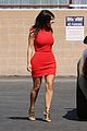 kim kardashian shows her figure in a tight little red dress 01