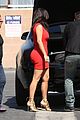 kim kardashian shows her figure in a tight little red dress 03
