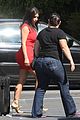 kim kardashian shows her figure in a tight little red dress 06