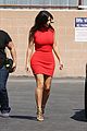 kim kardashian shows her figure in a tight little red dress 07