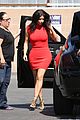 kim kardashian shows her figure in a tight little red dress 09