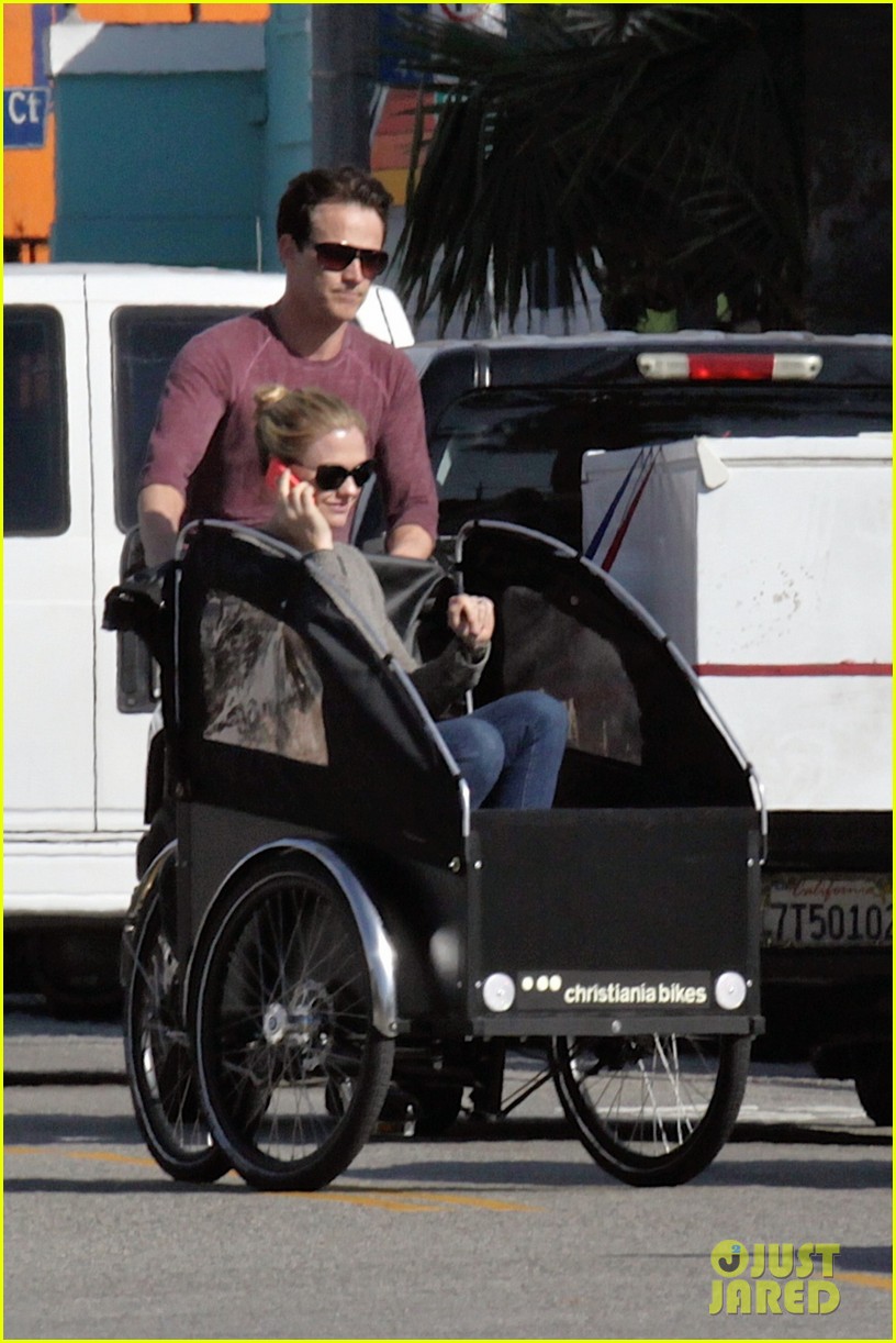 stephen moyer is quite the chauffeur peddles anna paquin in their twins bike carrier 043076097
