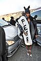 rihannas fur stole is covered in fear at paris fashion show 01