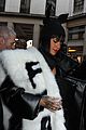 rihannas fur stole is covered in fear at paris fashion show 02