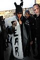 rihannas fur stole is covered in fear at paris fashion show 04