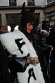 rihannas fur stole is covered in fear at paris fashion show 06