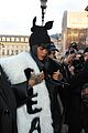 rihannas fur stole is covered in fear at paris fashion show 12