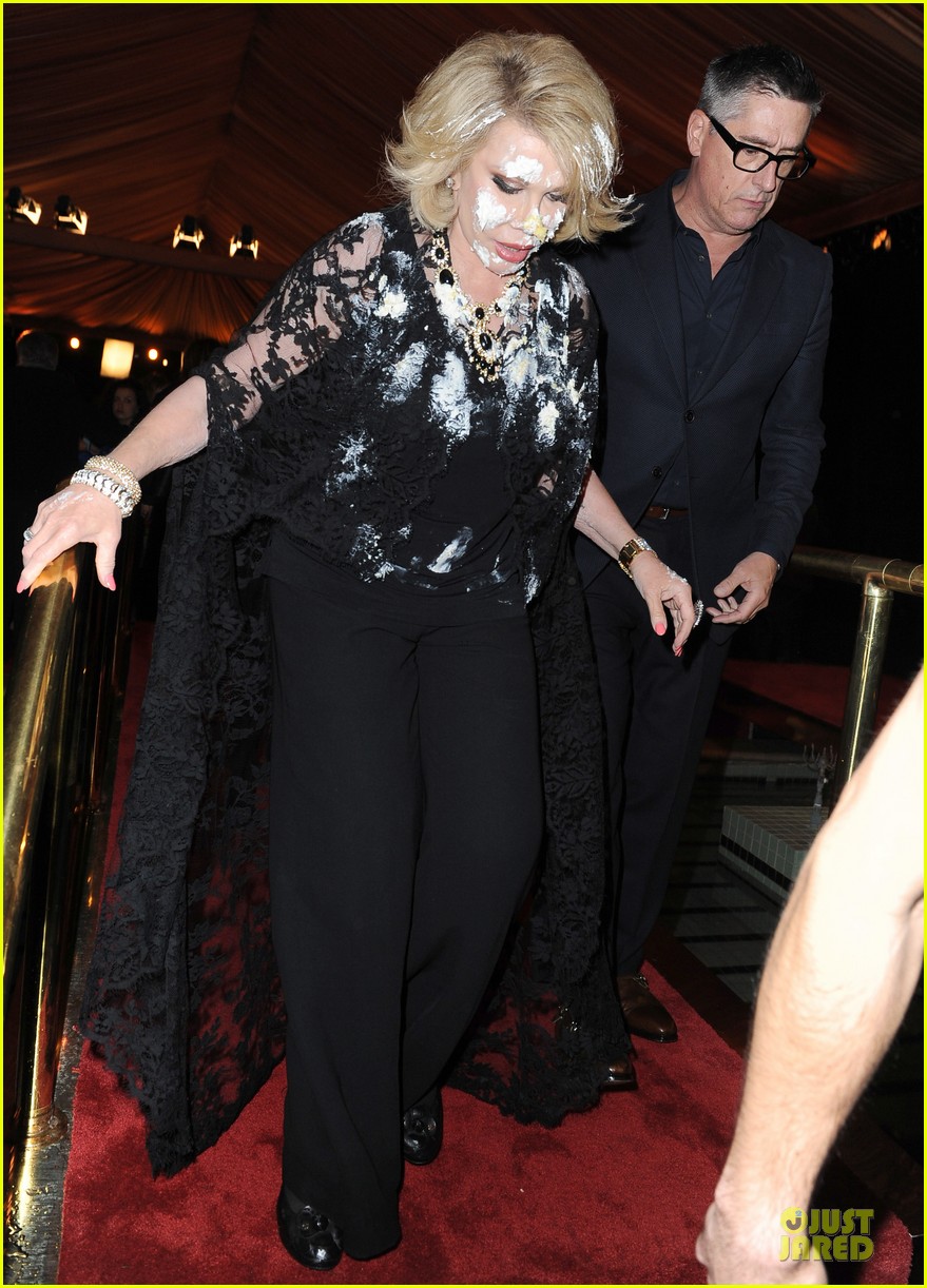 joan rivers gets attacked with cake at gvc red carpet event 03