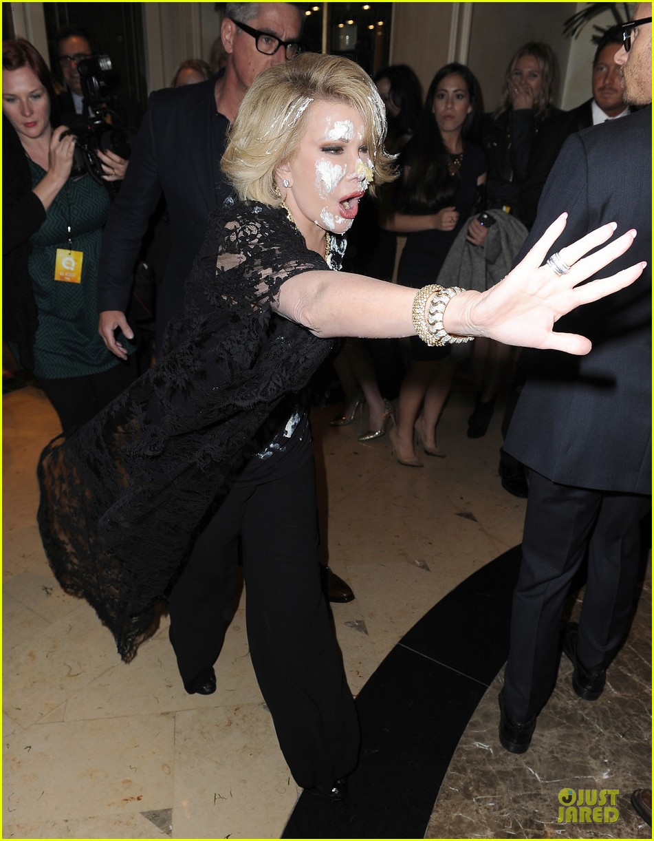 joan rivers gets attacked with cake at gvc red carpet event 053062659