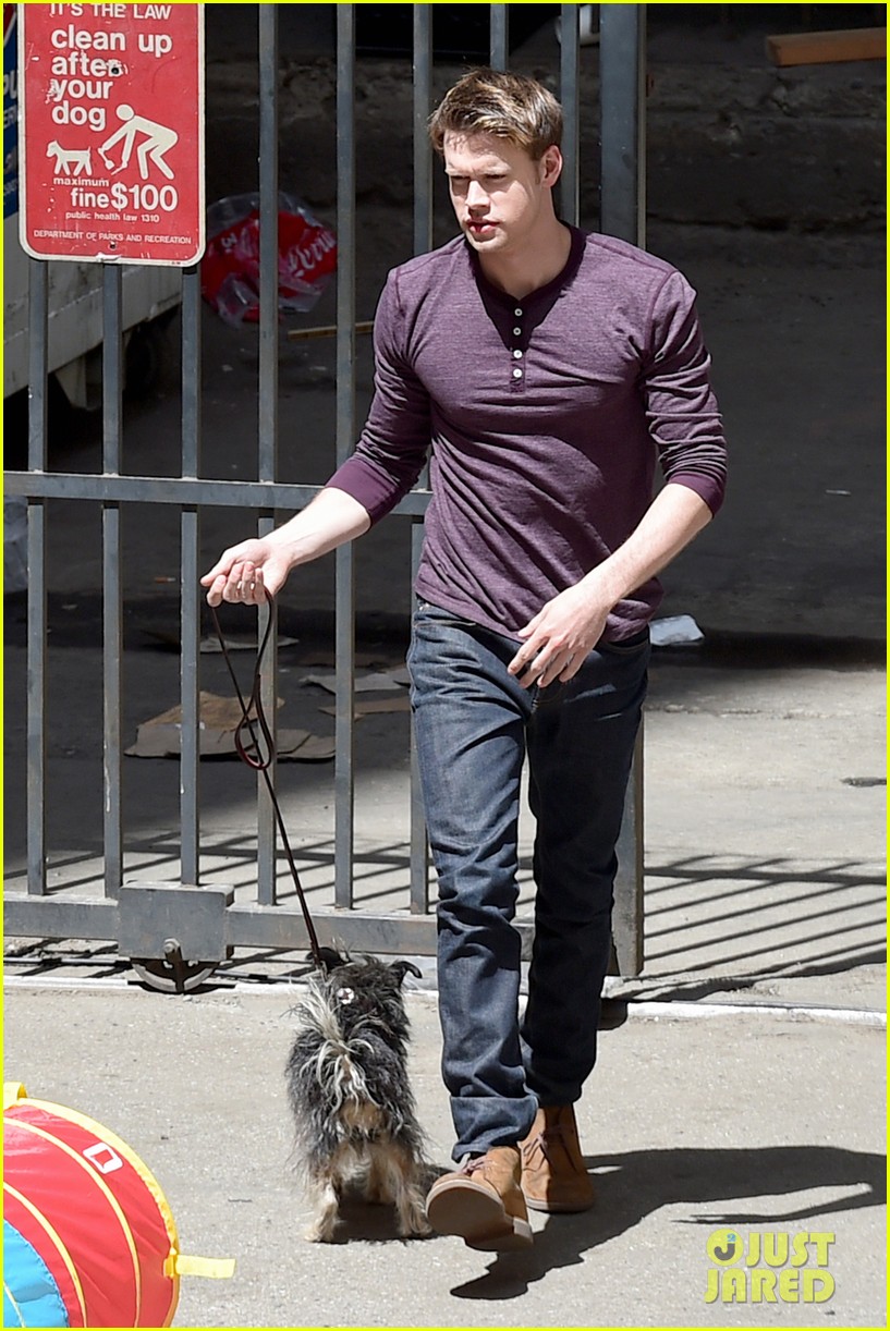 chord overstreet dotes on a dog its really cute 103098252
