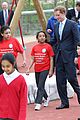 prince harry playing with kids at a playground 06