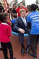 prince harry playing with kids at a playground 10