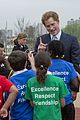 prince harry playing with kids at a playground 12