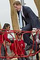 prince harry playing with kids at a playground 13