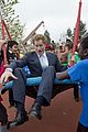 prince harry playing with kids at a playground 14