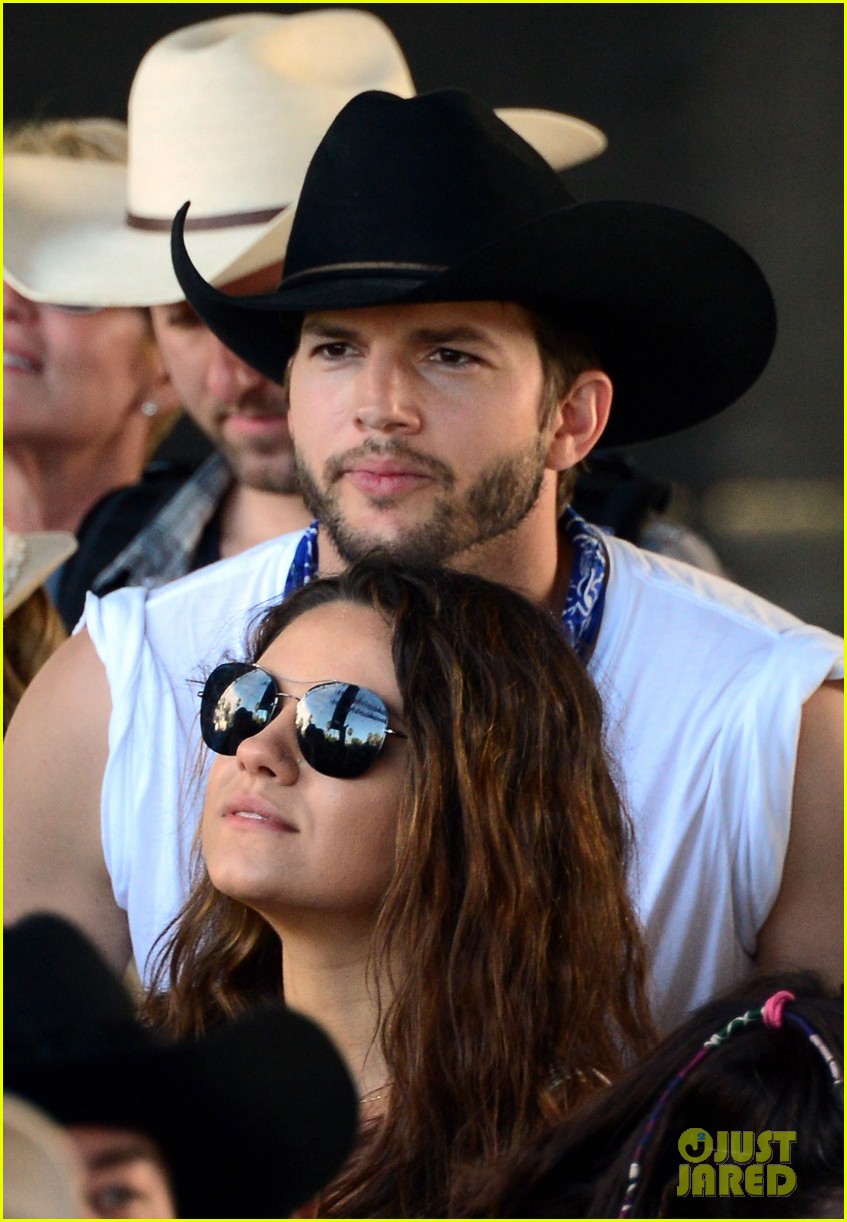 mila kunis reveals small baby bump in belly shirt packs on pda with ashton kutcher 053100537