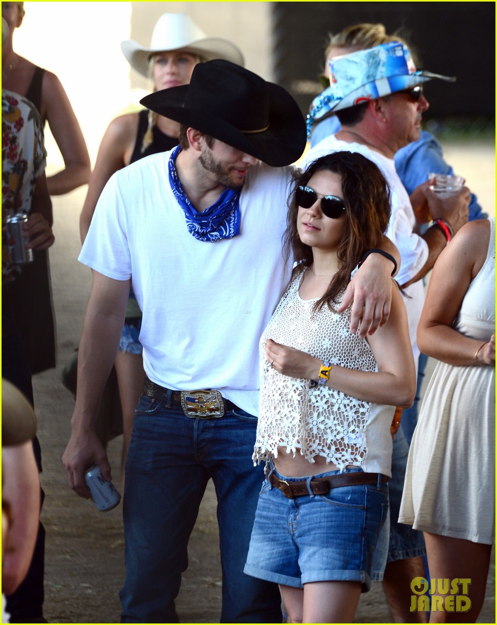 mila kunis reveals small baby bump in belly shirt packs on pda with ashton kutcher 093100541