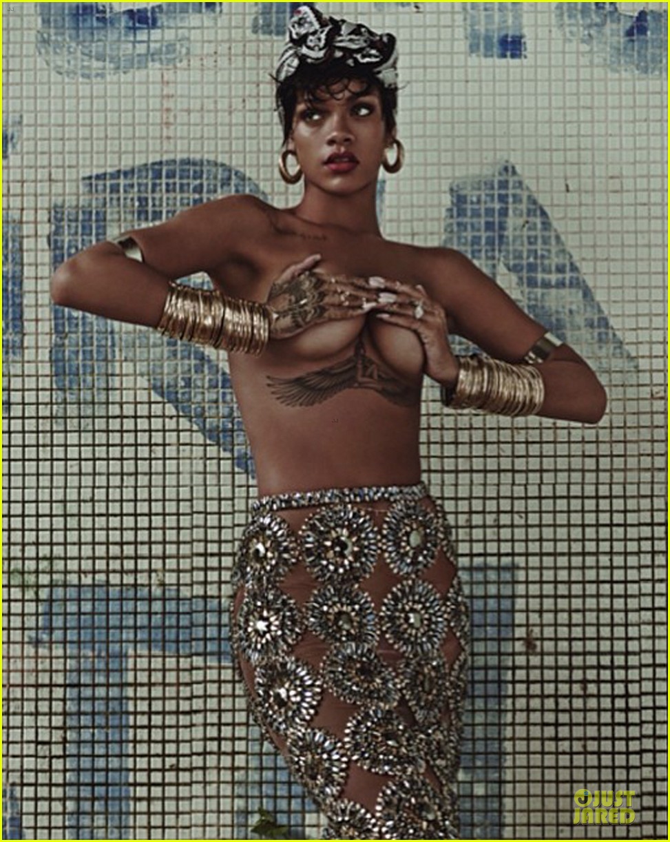 rihanna goes topless holds her boobs 04