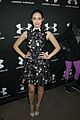 emmy rossum plays with shoes at under armour store launch 01