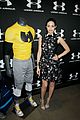 emmy rossum plays with shoes at under armour store launch 05