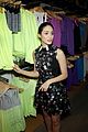 emmy rossum plays with shoes at under armour store launch 21