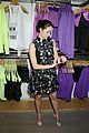 emmy rossum plays with shoes at under armour store launch 24