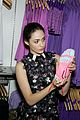 emmy rossum plays with shoes at under armour store launch 28