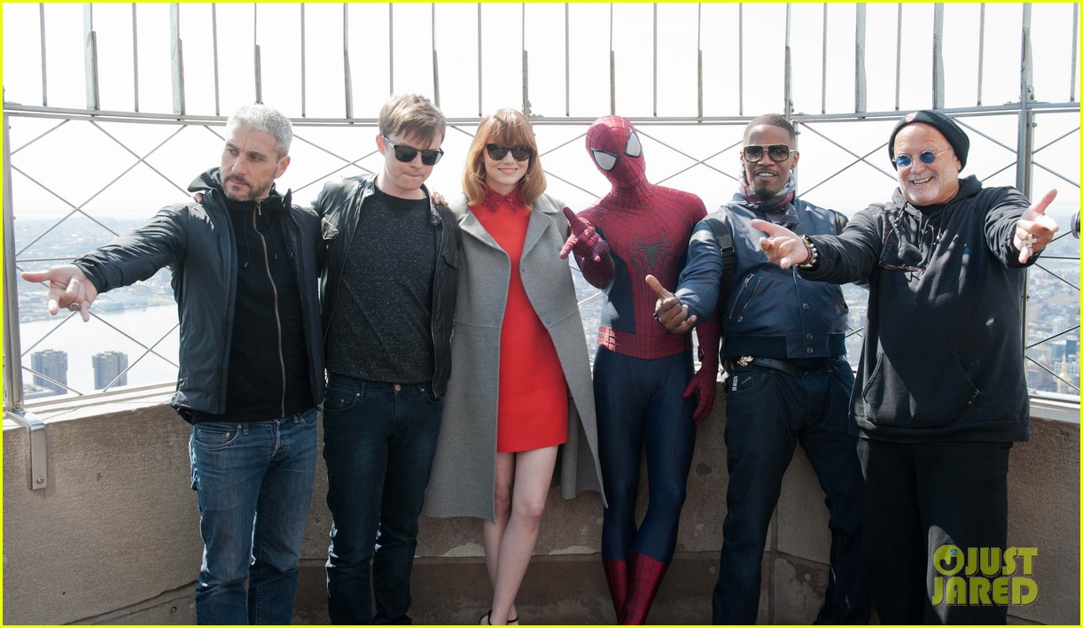 emma stone brings her bangs to the empire state building with spiderman cast 07