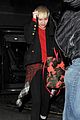 miley cyrus enters club fully clothed leaves in bra 01