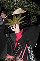 miley cyrus enters club fully clothed leaves in bra 07