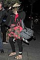 miley cyrus enters club fully clothed leaves in bra 08