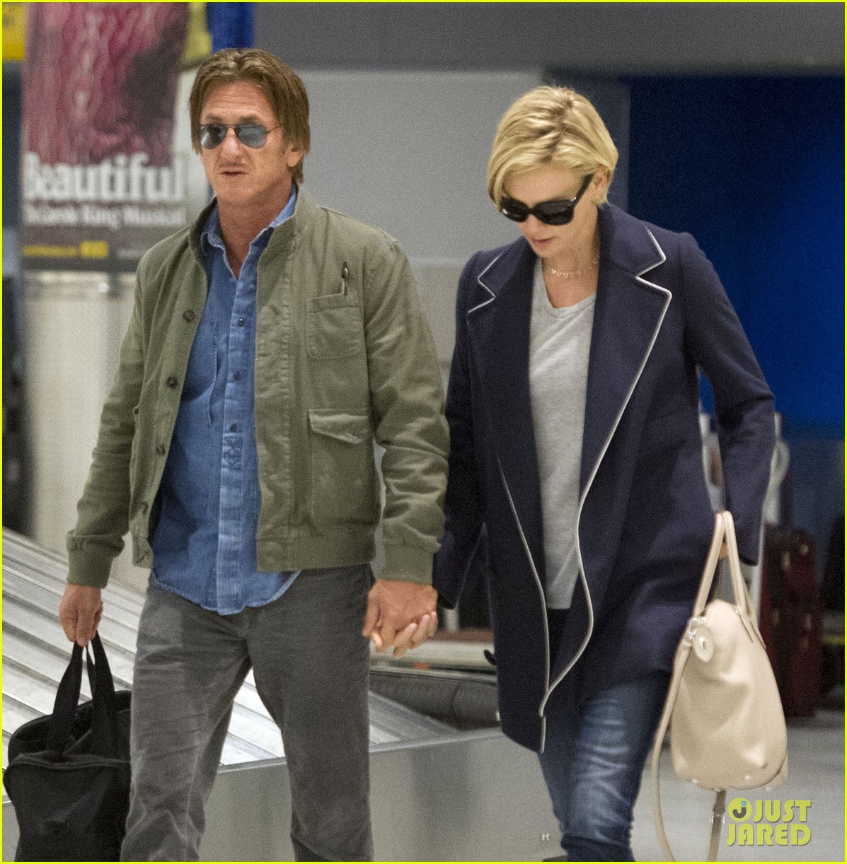 charlize theron sean penn hold hands upon new york arrival 26