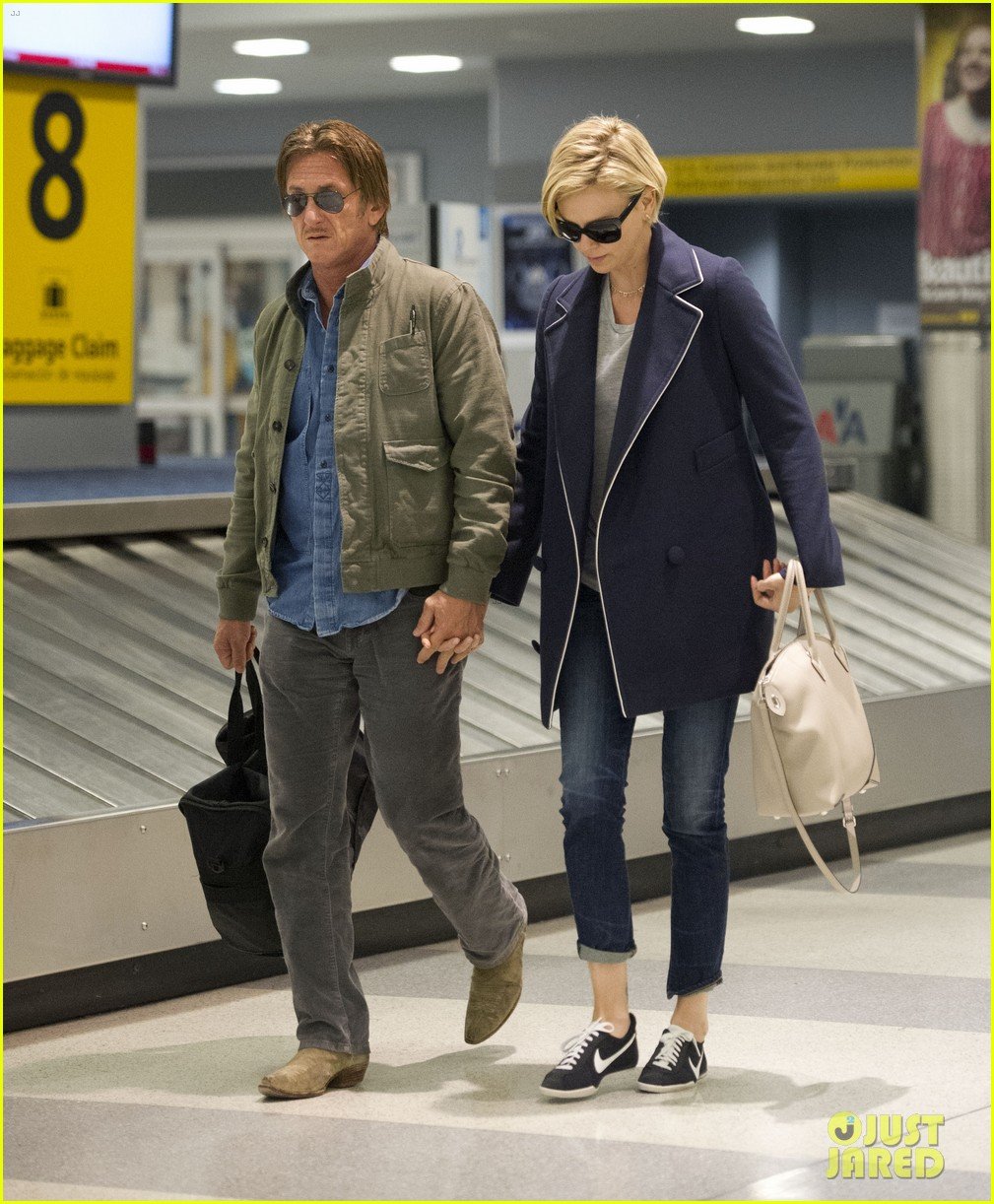 charlize theron sean penn hold hands upon new york arrival 283105582