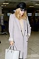 suki waterhouse jets out of france after cannes 04