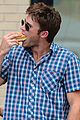 scott eastwood chows down on a hot dog 02